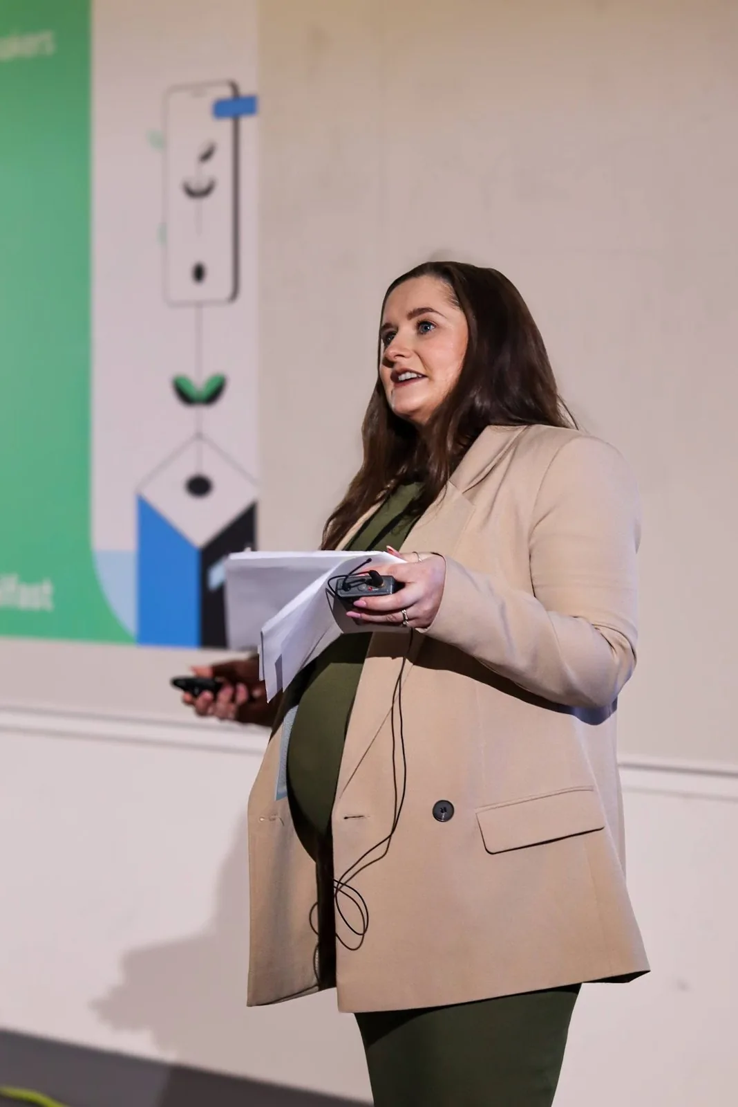 Katie presenting to a technology audience